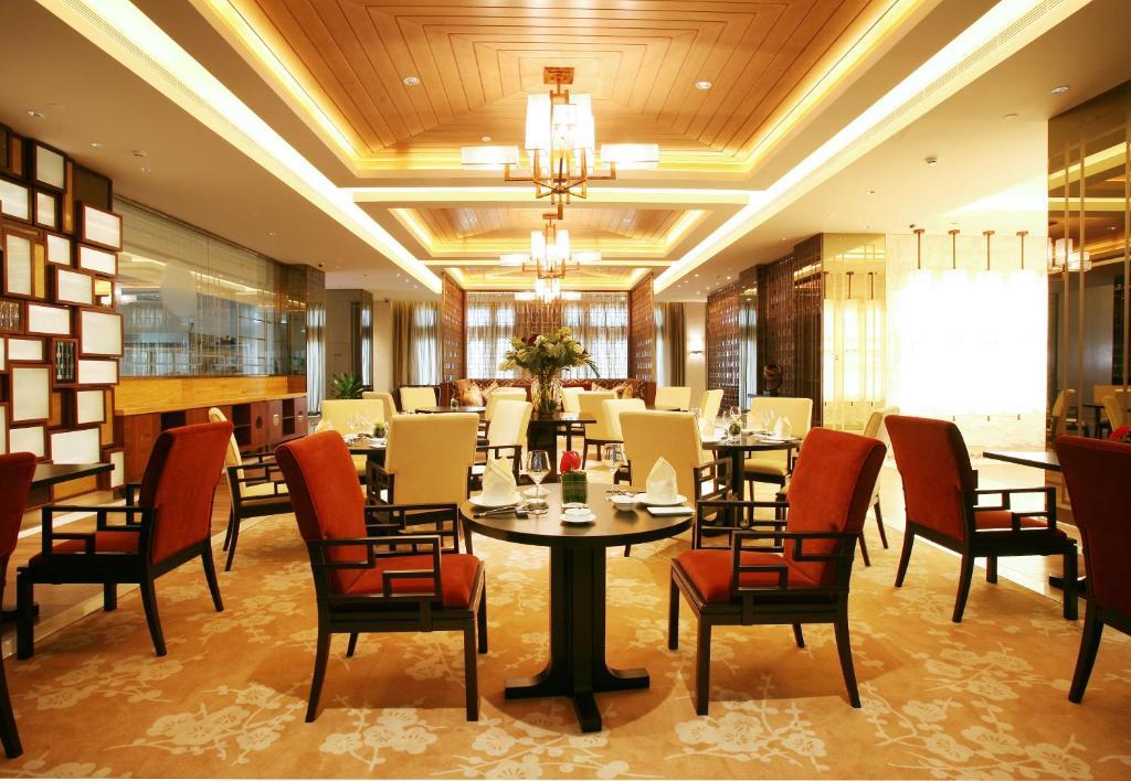 Landison Green Town Hotel Xinchang Екстериор снимка