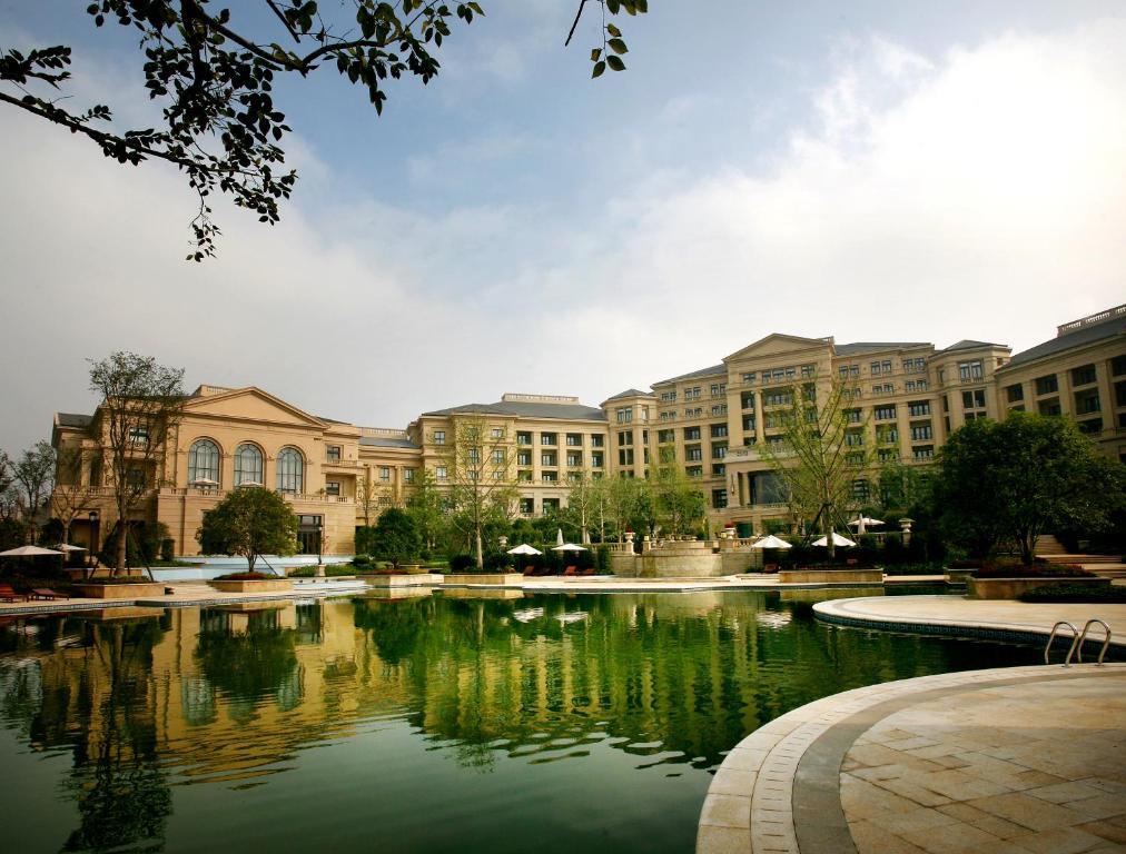 Landison Green Town Hotel Xinchang Екстериор снимка