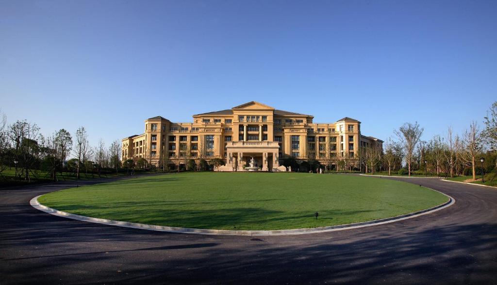 Landison Green Town Hotel Xinchang Екстериор снимка