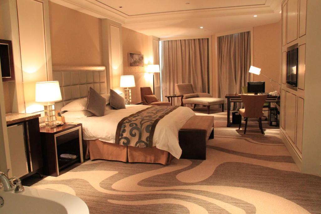 Landison Green Town Hotel Xinchang Стая снимка