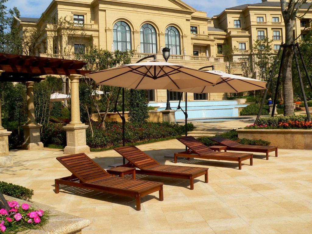 Landison Green Town Hotel Xinchang Екстериор снимка